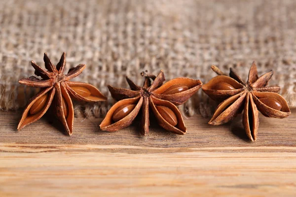 Star anise on wooden background — Stock Photo, Image