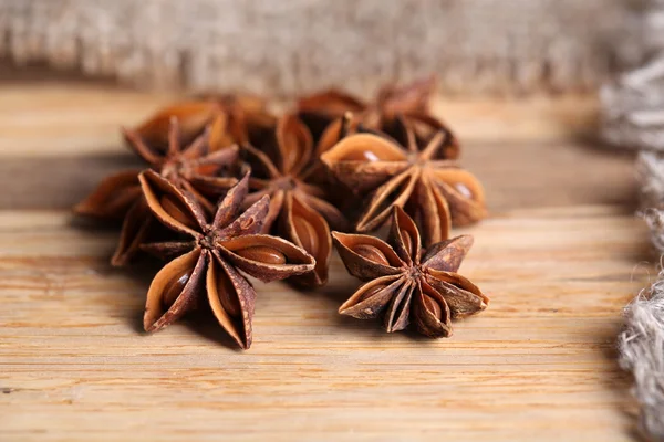 Star anise on wooden background — Stock Photo, Image