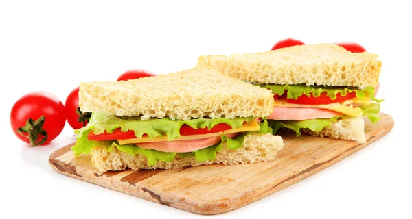 Fresh and tasty sandwiches on cutting board isolated on white — Stock Photo, Image