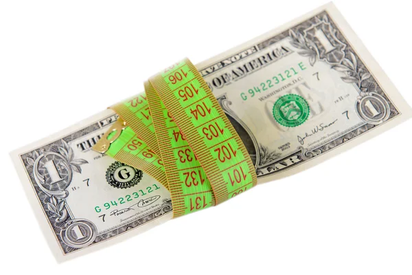 Fita métrica com dinheiro isolado em branco — Fotografia de Stock