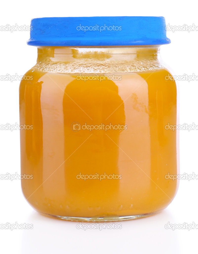 Baby food in glass jar, isolated on white