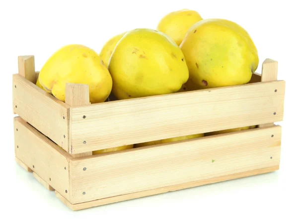 Sweet quinces in wooden box isolated on white — Stock Photo, Image