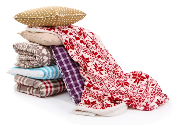 Warm plaids and pillows isolated on white — Stock Photo, Image