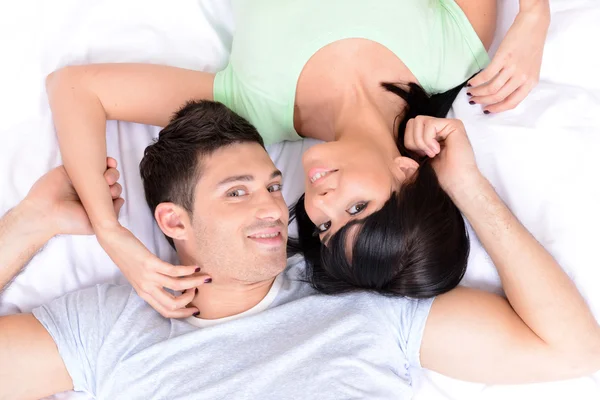 Couple in love in bed Royalty Free Stock Photos