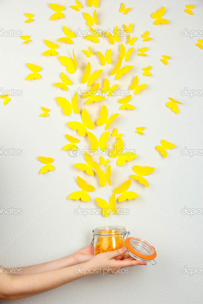 Paper yellow butterflies fly out of bank