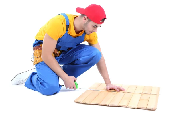 Trabajador joven aislado en blanco — Foto de Stock