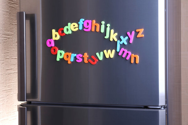 Colorful magnetic letters on refrigerator