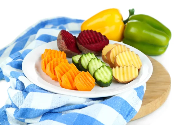 Beautiful sliced vegetables, on cutting board, isolated on white — Stock Photo, Image