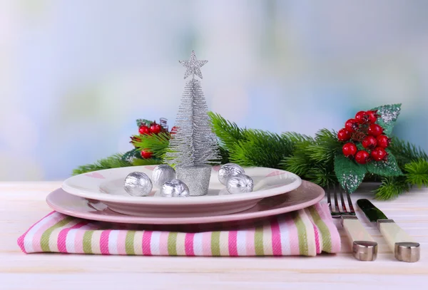 Set of utensil for Christmas dinner, on table, on light background — Stock Photo, Image