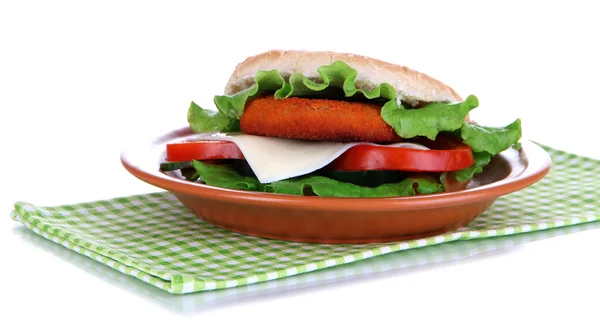कटलट के साथ स्वादिष्ट सैंडविच, रंग प्लेट पर, नैपकिन पर, सफेद पर अलग — स्टॉक फ़ोटो, इमेज
