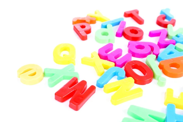 Colorful magnetic letters isolated on white — Stock Photo, Image