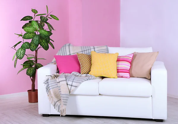 White sofa in room on pink wall background — Stock Photo, Image