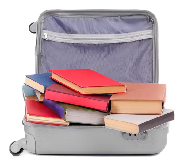 Maleta con libros aislados en blanco — Foto de Stock