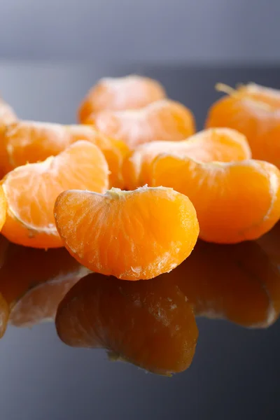Zralé sladká mandarinka výseče, close-up — Stock fotografie