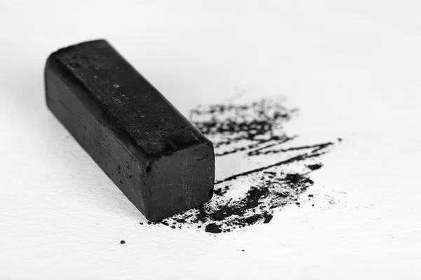 Svart teckning kol isolerad på vit — Stockfoto
