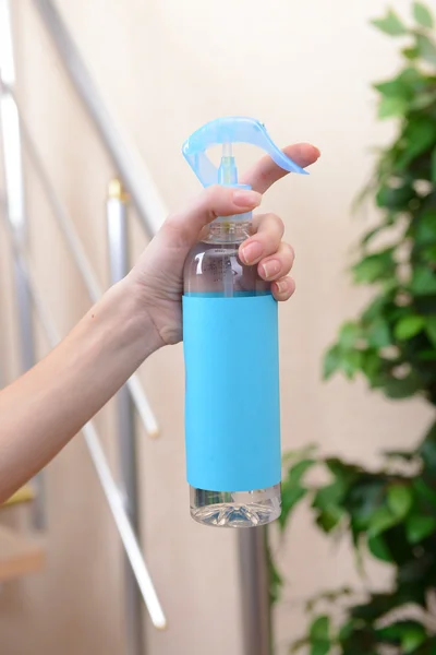 Sprayed air freshener in hand close-up — Stock Photo, Image