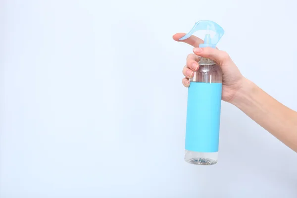 Sprayed air freshener in hand close-up — Stock Photo, Image