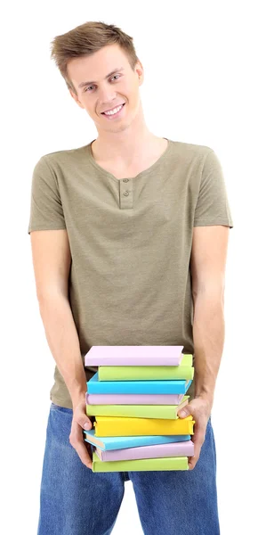 Joven guapo con libros, aislado en blanco — Foto de Stock