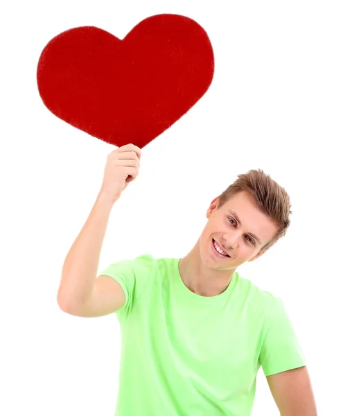 Handsome young man with big red heart, isolated on white Stock Photo