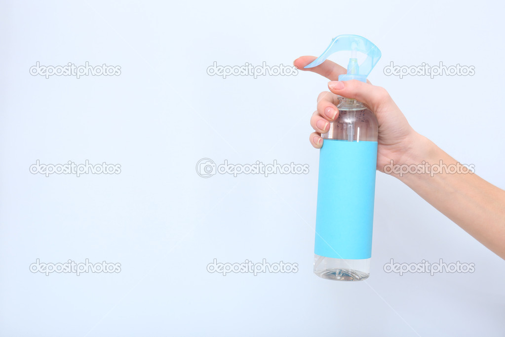 Sprayed air freshener in hand closeup Stock Photo by ©belchonock 39044713