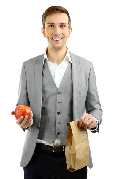 Joven profesor con almuerzo escolar aislado en blanco —  Fotos de Stock