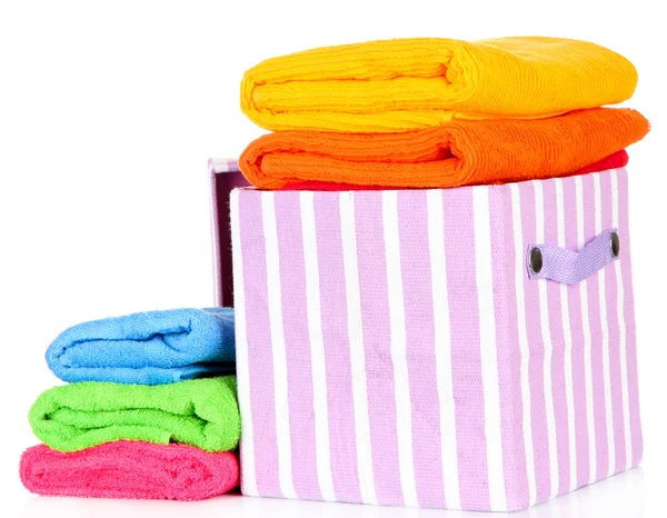 Textile box with bright towels, isolated on white — Stock Photo, Image