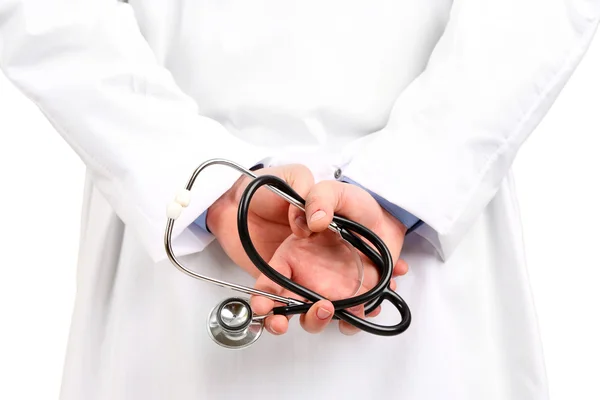 Männlicher Arzt steht auf grauem Hintergrund — Stockfoto