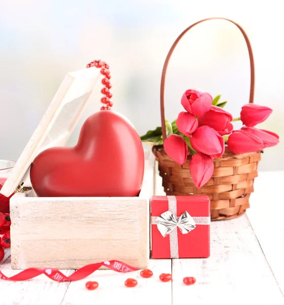 Romantic still life with heart in wooden casket — Stock Photo, Image