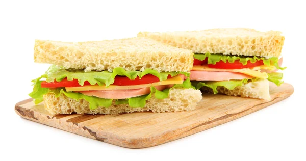 Sandwiches frescos y sabrosos en tabla de cortar aislada en blanco — Foto de Stock