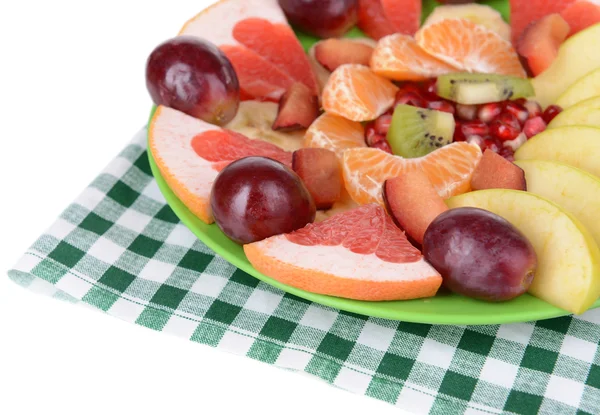 Söta färska frukter på tallriken på bordet närbild — Stockfoto