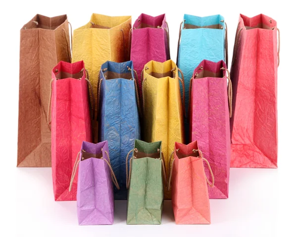 Bolsas de compras coloridas, aisladas en blanco — Foto de Stock