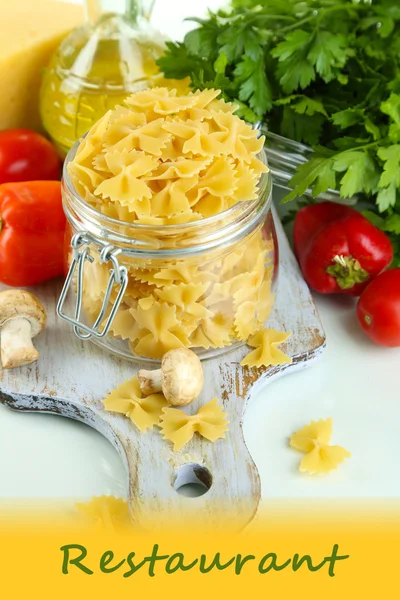 Pasta with oil, cheese and vegetables isolated on white — Stock Photo, Image