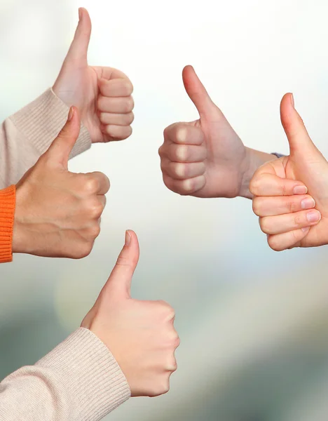 Human hands on bright background — Stock Photo, Image