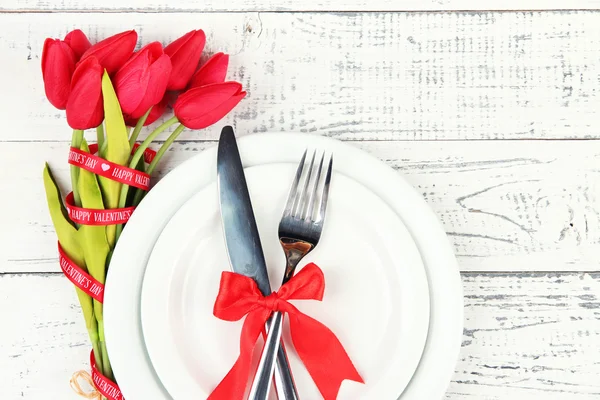 Romantic holiday table setting, on wooden background — Stock Photo, Image