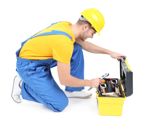 Male builder in yellow helmet isolated on white — Stock Photo, Image