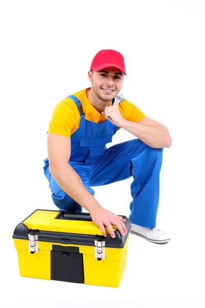Trabalhador masculino com caixa de ferramentas isolada em branco — Fotografia de Stock
