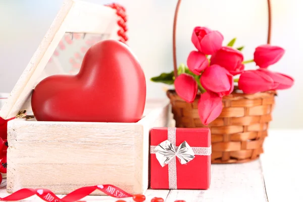 Romantic still life with heart in wooden casket — Stock Photo, Image