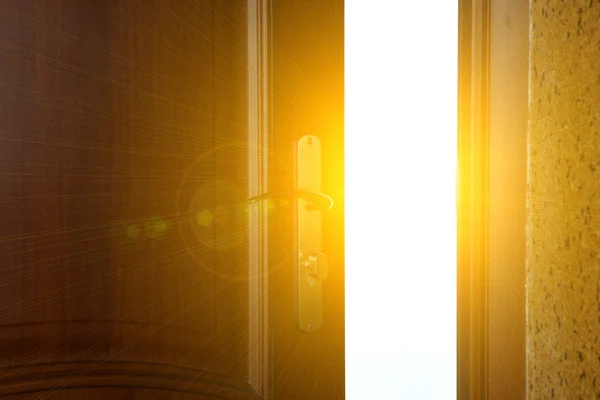 Open door with light outside — Stock Photo, Image