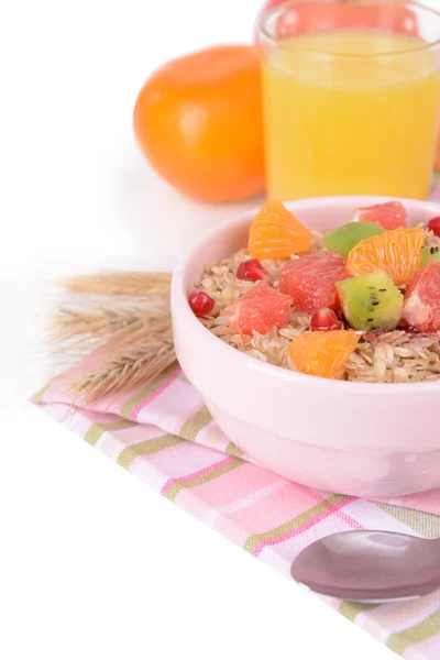 Delicious oatmeal with fruit in bowl on table close-up — Stock Photo, Image