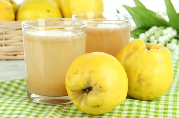 Sweet quince with juice on table close-up — Stock Photo, Image