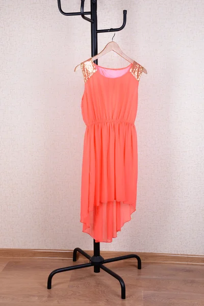 Dress hanging on hanger — Stock Photo, Image