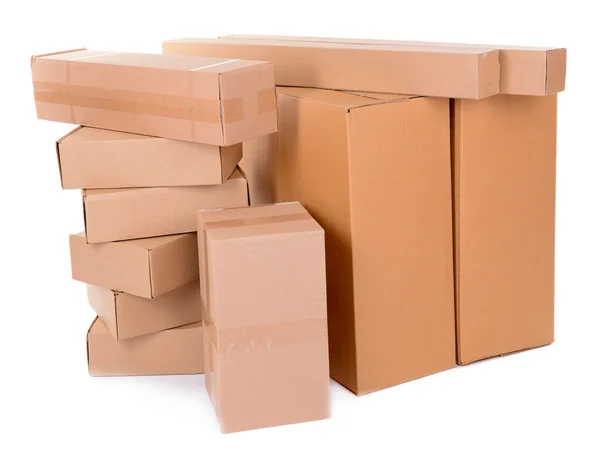 Різні картонні коробки ізольовані на білому — стокове фото