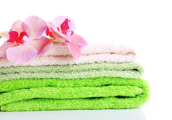 Orchid flower and towels, isolated on white — Stock Photo, Image