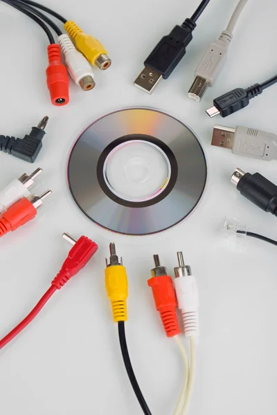 Disk and various connector cables isolated on white — Stock Photo, Image