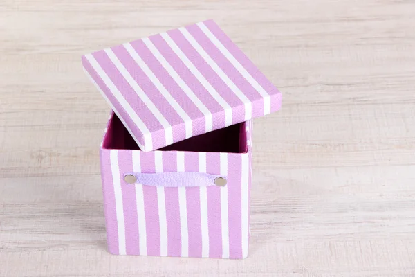 Textile box on floor in room — Stock Photo, Image