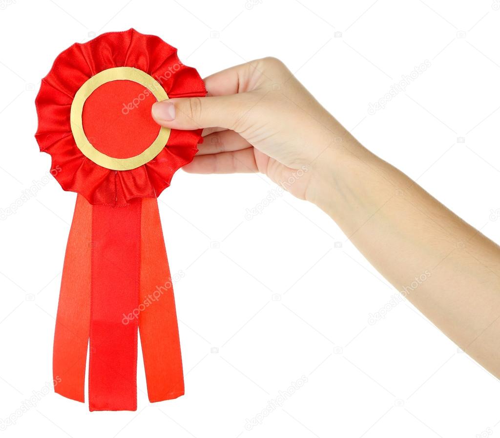 Red ribbon is symbol for success and first prize, isolated on white