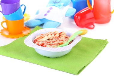 Yulaf lapası bebek oyuncakları arka plan üzerinde için kase