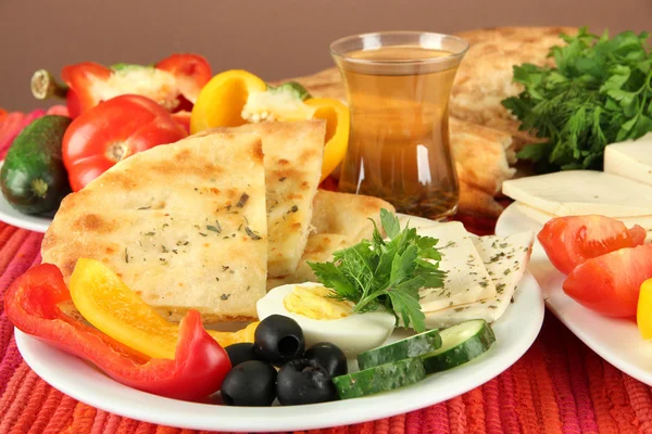 Traditional Turkish breakfast on table on brown background — Stock Photo, Image