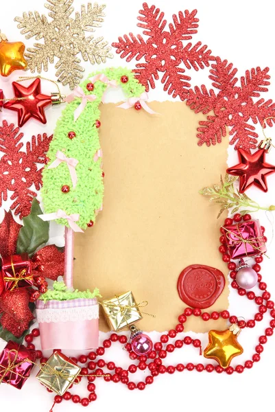 Cornice con carta vintage e decorazioni natalizie da vicino — Foto Stock