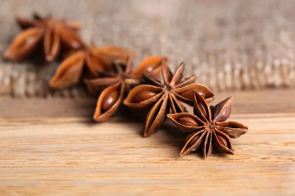 Star anise on wooden background — Stock Photo, Image